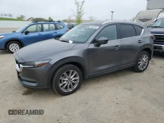 2020 Mazda CX-5 Grand Touring with VIN JM3KFBDM6L1720506, listed as a Copart auction lot 56638385 with 68,808 mi miles and Salvage title. Bid and sale history available at DreamBid. Image 1.