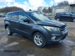 2017 Ford Escape SE with VIN 1FMCU9GDXHUA10453, listed as a IAAI auction lot 41860507 with 175,733 mi miles and . Bid and sale history available at DreamBid. Image 1.