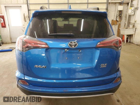 2018 Toyota RAV4 XLE with VIN JTMRFREV2JD234746, listed as a Copart auction lot 52576205 with 0 mi miles and Salvage Title. Bid and sale history available at carsss.com. Image 6.
