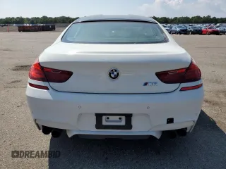 2015 BMW M6 z VIN WBS6C9C5XFD467711, wystawiony jako Copart lot #66574644 z przebiegiem 101 001 mil mil oraz Szkody całkowita. Historia ofert i sprzedaży dostępna na DreamBid. Obrazek 6.