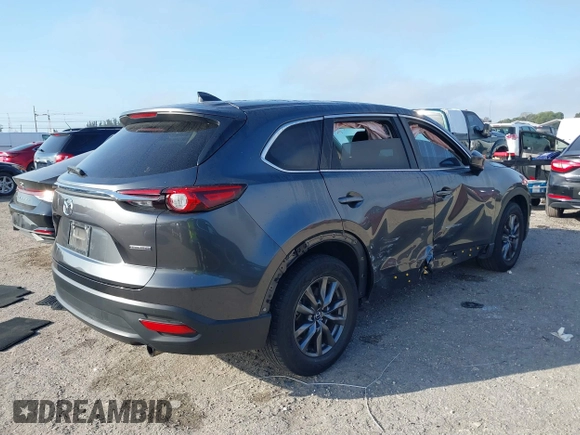 2022 Mazda CX-9 Touring with VIN JM3TCBCY3N0613844, listed as a IAAI auction lot 41498368 with 24,585 mi miles. Bid and sale history available at carsss.com. Image 4.