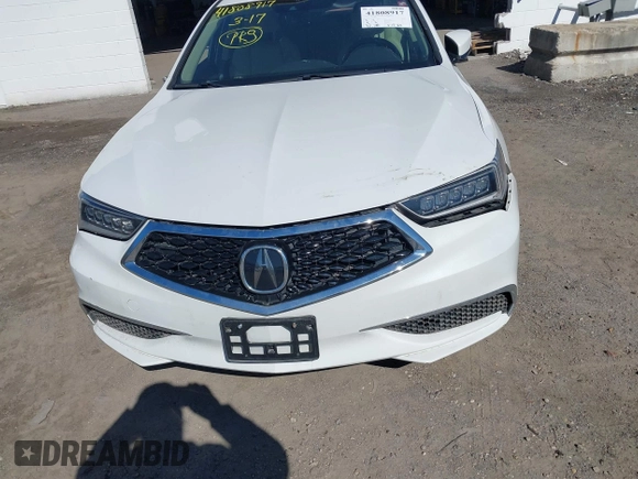 2019 Acura TLX with VIN 19UUB2F33KA003854, listed as a IAAI auction lot 41808917 with 95,380 mi miles and . Bid and sale history available at DreamBid. Image 6.