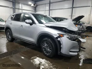 2019 Mazda CX-5 Touring with VIN JM3KFACM4K1552732, listed as a Copart auction lot 48226525 with 125,429 mi miles and Salvage Title. Bid and sale history available at carsss.com. Image 4.