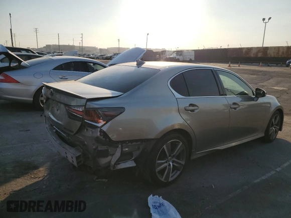 2016 Lexus GS 200t with VIN JTHBA1BL1GA000286, listed as a Copart auction lot 87590975 with 75,064 mi miles and Salvage title. Bid and sale history available at DreamBid. Image 3.