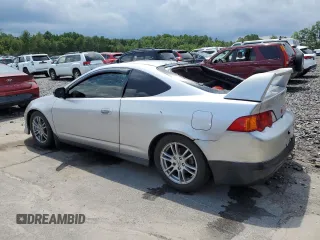 2002 Acura RSX Auto with VIN JH4DC54882C011723, listed as a Copart auction lot 64187865 with 106,692 mi miles and Clean title. Bid and sale history available at DreamBid. Image 2.