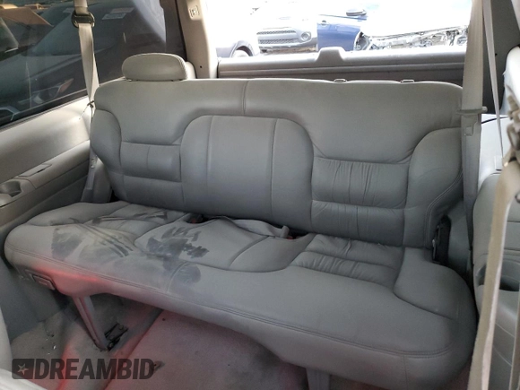 1999 Chevrolet Tahoe with VIN 3GNEC18R1XG143882, listed as a Copart auction lot 42177005 with 130,368 mi miles and Salvage title. Bid and sale history available at DreamBid. Image 11.