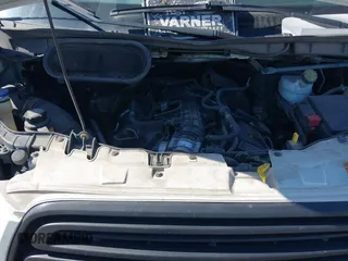 2019 Ford Transit Cargo with VIN 1FTBF4XG4KKB77790, listed as a IAAI auction lot 41711746 with 198,739 mi miles. Bid and sale history available at carsss.com. Image 10.