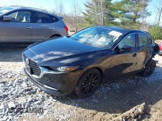 2023 Mazda 3 Premium Plus with VIN 3MZBPBEY9PM385318, listed as a IAAI auction lot 41882334 with 10,582 mi miles and . Bid and sale history available at DreamBid. Image 2.