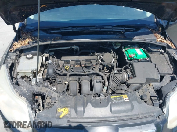 2012 Ford Focus SE with VIN 1FAHP3F24CL471005, listed as a IAAI auction lot 42726292 with 162,750 mi miles and . Bid and sale history available at DreamBid. Image 10.