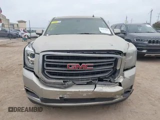 2015 GMC Yukon XL SLE z VIN 1GKS1GKC1FR155056, wystawiony jako IAAI lot #41517607 z przebiegiem 174 634 mil mil oraz . Historia ofert i sprzedaży dostępna na DreamBid. Obrazek 12.