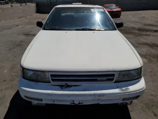 1990 Nissan Maxima z VIN JN1HJ01PXLT390008, wystawiony jako Copart lot #53529815 z przebiegiem 163 186 mil mil oraz Tytuł czysty. Historia ofert i sprzedaży dostępna na DreamBid. Obrazek 5.