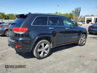2015 Jeep Grand Cherokee Overland with VIN 1C4RJFCT6FC628729, listed as a Copart auction lot 50192705 with 106,102 mi miles and Salvage Title. Bid and sale history available at carsss.com. Image 3.