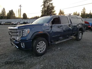 2020 GMC Sierra 3500HD Denali z VIN 1GT49WEY5LF210345, wystawiony jako Copart lot #89412745 z przebiegiem 20 328 mil mil oraz Szkody całkowita. Historia ofert i sprzedaży dostępna na DreamBid. Obrazek 1.