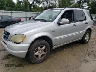 2000 Mercedes-Benz M-Class with VIN 4JGAB54E5YA202352, listed as a Copart auction lot 73734624 with 295,895 mi miles and Salvage Title. Bid and sale history available at carsss.com. Image 1.