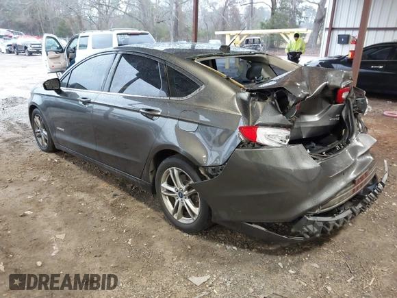 2015 Ford Fusion SE Hybrid with VIN 3FA6P0LU6FR248904, listed as a IAAI auction lot 41556607 with 224,799 mi miles. Bid and sale history available at carsss.com. Image 3.