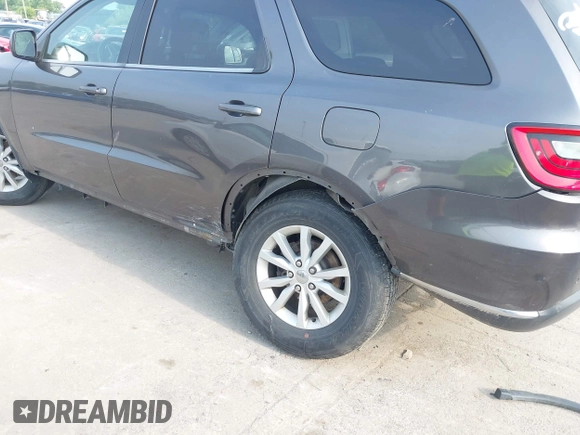 2015 Dodge Durango SXT with VIN 1C4RDJAG8FC939000, listed as a IAAI auction lot 42459660 with 108,101 mi miles and . Bid and sale history available at DreamBid. Image 6.