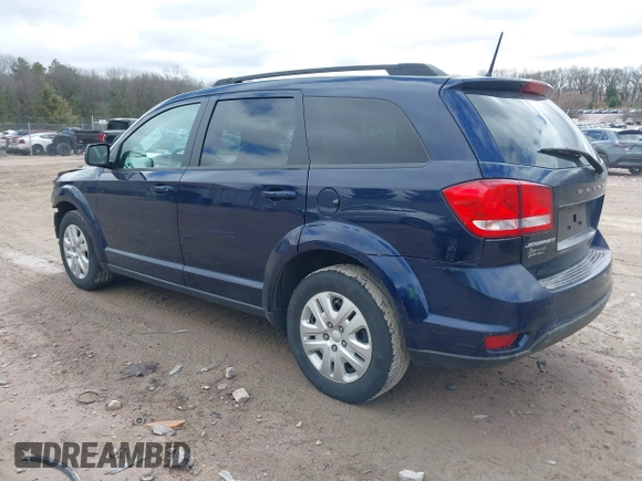 2019 Dodge Journey SE with VIN 3C4PDCBBXKT707700, listed as a IAAI auction lot 42038474 with 57,903 mi miles and . Bid and sale history available at DreamBid. Image 3.