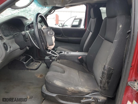 2009 Mazda B-Series 4WD Truck with VIN 4F4ZR47E09PM00917, listed as a Copart auction lot 86702424 with 213,082 mi miles and Non Repairable. Bid and sale history available at carsss.com. Image 7.