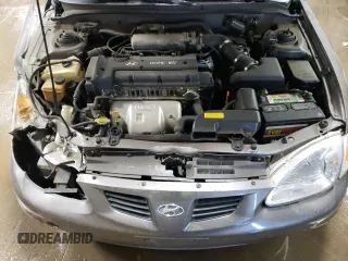 2000 Hyundai Elantra GLS z VIN KMHJF35F1YU995390, wystawiony jako Copart lot #78523024 z przebiegiem 130 349 mil mil oraz Szkoda całkowita • Salvage title. Historia ofert i sprzedaży dostępna na DreamBid. Obrazek 11.