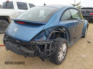 2019 Volkswagen Beetle S with VIN 3VWFD7AT8KM708865, listed as a IAAI auction lot 41692756 with 35,070 mi miles. Bid and sale history available at carsss.com. Image 4.