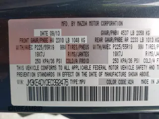 2014 Mazda CX-5 Grand Touring with VIN JM3KE4DY0E0392476, listed as a IAAI auction lot 41419144 with 89,245 mi miles and . Bid and sale history available at carsss.com. Image 9.