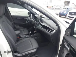 2021 BMW X1 xDrive28i with VIN WBXJG9C01M5S06181, listed as a IAAI auction lot 42292167 with 55,966 mi miles and . Bid and sale history available at DreamBid. Image 5.