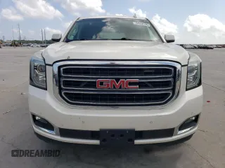 2015 GMC Yukon SLT z VIN 1GKS1BKC4FR552523, wystawiony jako Copart lot #54658135 z przebiegiem 93 907 mil mil oraz Czysty tytuł • Clean title. Historia ofert i sprzedaży dostępna na DreamBid. Obrazek 5.