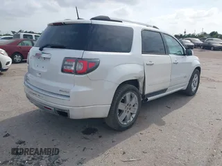 2016 GMC Acadia Denali with VIN 1GKKVTKD2GJ214010, listed as a IAAI auction lot 42082570 with 143,754 mi miles. Bid and sale history available at carsss.com. Image 4.