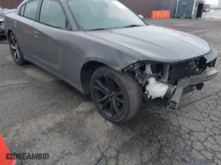 2017 Dodge Charger SE with VIN 2C3CDXBG7HH553583, listed as a IAAI auction lot 41925229 with 121,777 mi miles. Bid and sale history available at carsss.com. Image 1.