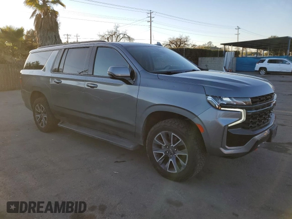 2021 Chevrolet Suburban Z71 with VIN 1GNSKDKDXMR310076, listed as a Copart auction lot 43055185 with 88,300 mi miles and Salvage title. Bid and sale history available at DreamBid. Image 4.