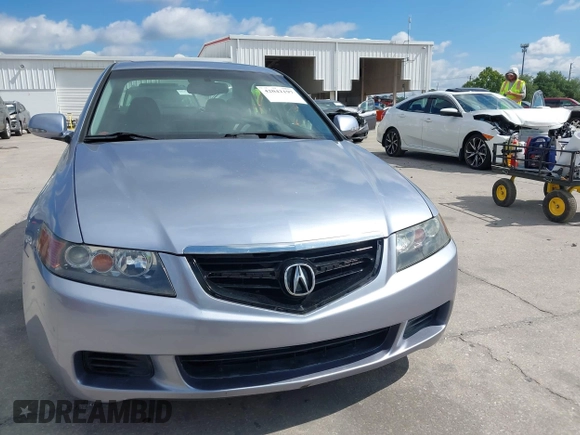2004 Acura TSX w/Navigation with VIN JH4CL96944C045735, listed as a IAAI auction lot 42042197 with 197,900 mi miles. Bid and sale history available at carsss.com. Image 12.
