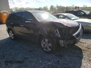 2012 Kia Sorento EX z VIN 5XYKU4A25CG198223, wystawiony jako Copart lot #55207625 z przebiegiem 75 146 mil mil oraz Szkoda całkowita • Salvage title. Historia ofert i sprzedaży dostępna na DreamBid. Obrazek 4.