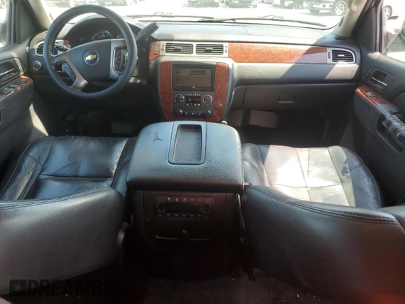 2013 Chevrolet Suburban LT with VIN 1GNSCJE0XDR146798, listed as a Copart auction lot 62408525 with 218,484 mi miles and Salvage title. Bid and sale history available at DreamBid. Image 8.