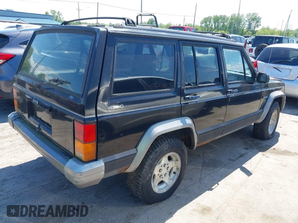 1995 Jeep Cherokee Country z VIN 1J4FJ78S9SL666002, wystawiony jako IAAI lot #42313644 z przebiegiem 226 914 mil mil oraz . Historia ofert i sprzedaży dostępna na DreamBid. Obrazek 4.