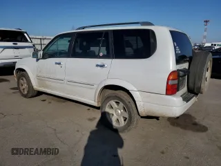 2002 Suzuki XL-7 Standard with VIN JS3TX92VX24118298, listed as a Copart auction lot 42781415 with 312,010 mi miles and Salvage Title. Bid and sale history available at carsss.com. Image 2.