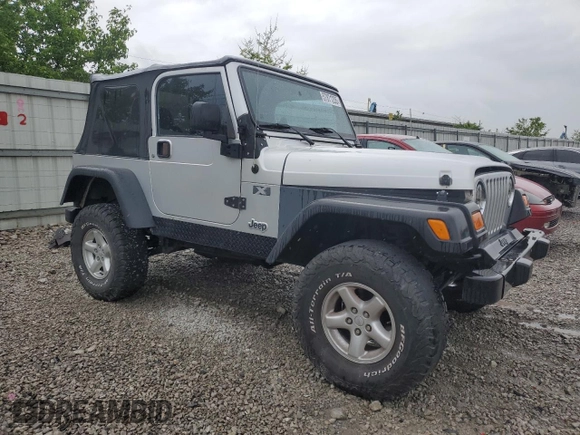 2004 Jeep Wrangler X with VIN 1J4FA39S24P714961, listed as a Copart auction lot 57871235 with 123,164 mi miles and Clean title. Bid and sale history available at DreamBid. Image 4.