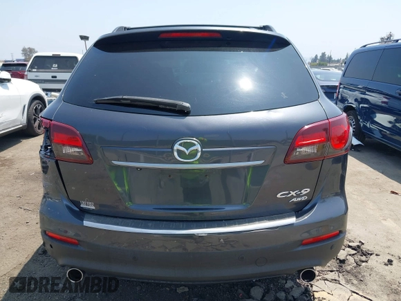 2015 Mazda CX-9 Grand Touring with VIN JM3TB3DA0F0459024, listed as a IAAI auction lot 42452288 with 174,716 mi miles and . Bid and sale history available at DreamBid. Image 16.