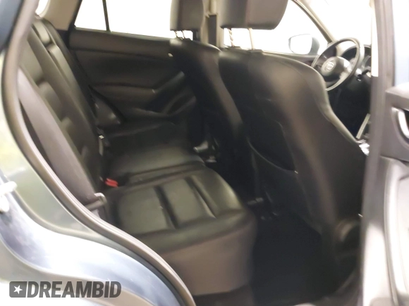 2015 Mazda CX-5 Grand Touring with VIN JM3KE4DY7F0504398, listed as a IAAI auction lot 41698365 with 122,121 mi miles. Bid and sale history available at carsss.com. Image 8.