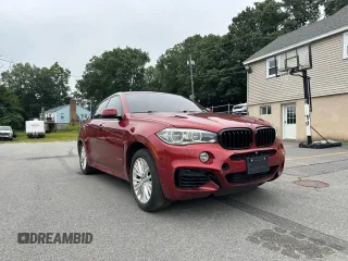2015 BMW X6 xDrive50i with VIN 5UXKU6C59F0F93634, listed as a Copart auction lot 68158794 with 109,923 mi miles and Clean Title. Bid and sale history available at carsss.com. Image 4.