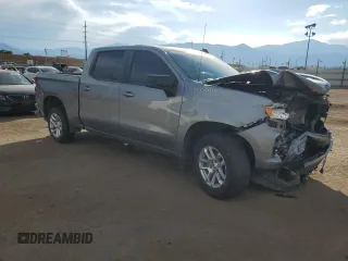 2023 Chevrolet Silverado 1500 RST with VIN 1GCUDEE87PZ141591, listed as a Copart auction lot 76496604 with 60,891 mi miles and Salvage Title. Bid and sale history available at DreamBid. Image 4.
