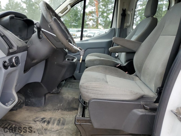 2016 Ford Transit Cargo Van with VIN 1FTYR1ZM6GKA89981, listed as a Copart auction lot 46722125 with 203,979 mi miles and Salvage Title. Bid and sale history available at carsss.com. Image 7.