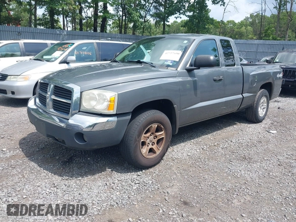 2005 Dodge Dakota SLT with VIN 1D7HW42N25S155393, listed as a IAAI auction lot 42727690 with 230,042 mi miles and . Bid and sale history available at DreamBid. Image 2.
