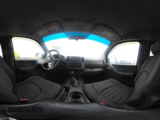 2005 Nissan Frontier LE with VIN 1N6AD06W55C433921, listed as a IAAI auction lot 42263626 with 107,404 mi miles and . Bid and sale history available at DreamBid. Image 21.