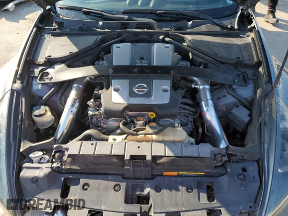 2017 Nissan 370Z z VIN JN1AZ4EH1HM950035, wystawiony jako Copart lot #70534664 z przebiegiem 63 667 mil mil oraz Szkoda całkowita • Salvage title. Historia ofert i sprzedaży dostępna na DreamBid. Obrazek 12.