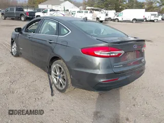 2019 Ford Fusion Hybrid Titanium with VIN 3FA6P0RU9KR158129, listed as a IAAI auction lot 41717104 with 37,736 mi miles. Bid and sale history available at carsss.com. Image 3.