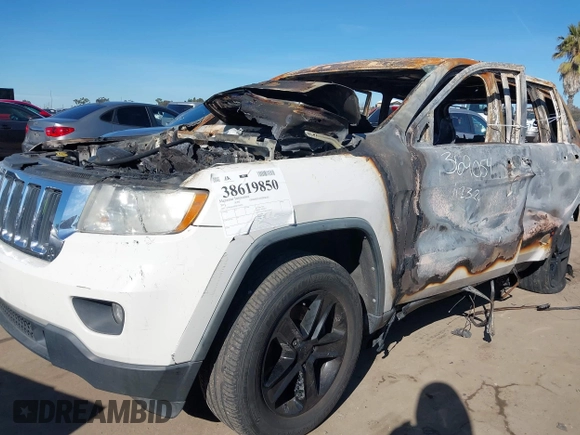 2011 Jeep Grand Cherokee Laredo with VIN 1J4RS4GG2BC618072, listed as a IAAI auction lot 38619850 with Not Provided miles and . Bid and sale history available at DreamBid. Image 6.