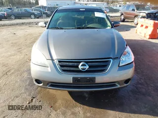 2004 Nissan Altima S with VIN 1N4AL11D24C102557, listed as a IAAI auction lot 41663563 with 151,144 mi miles. Bid and sale history available at carsss.com. Image 12.