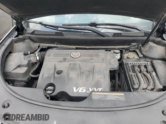 2014 Cadillac SRX Premium Collection with VIN 3GYFNGE3XES560903, listed as a Copart auction lot 52529525 with 117,780 mi miles and Salvage title. Bid and sale history available at DreamBid. Image 12.