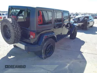 2013 Jeep Wrangler Unlimited Sahara with VIN 1C4BJWEG3DL617511, listed as a IAAI auction lot 41842979 with 149,980 mi miles and . Bid and sale history available at DreamBid. Image 4.