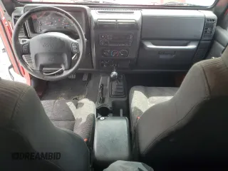 2003 Jeep Wrangler Sport with VIN 1J4FA49S83P369892, listed as a Copart auction lot 56536745 with 182,535 mi miles and Salvage title. Bid and sale history available at DreamBid. Image 8.